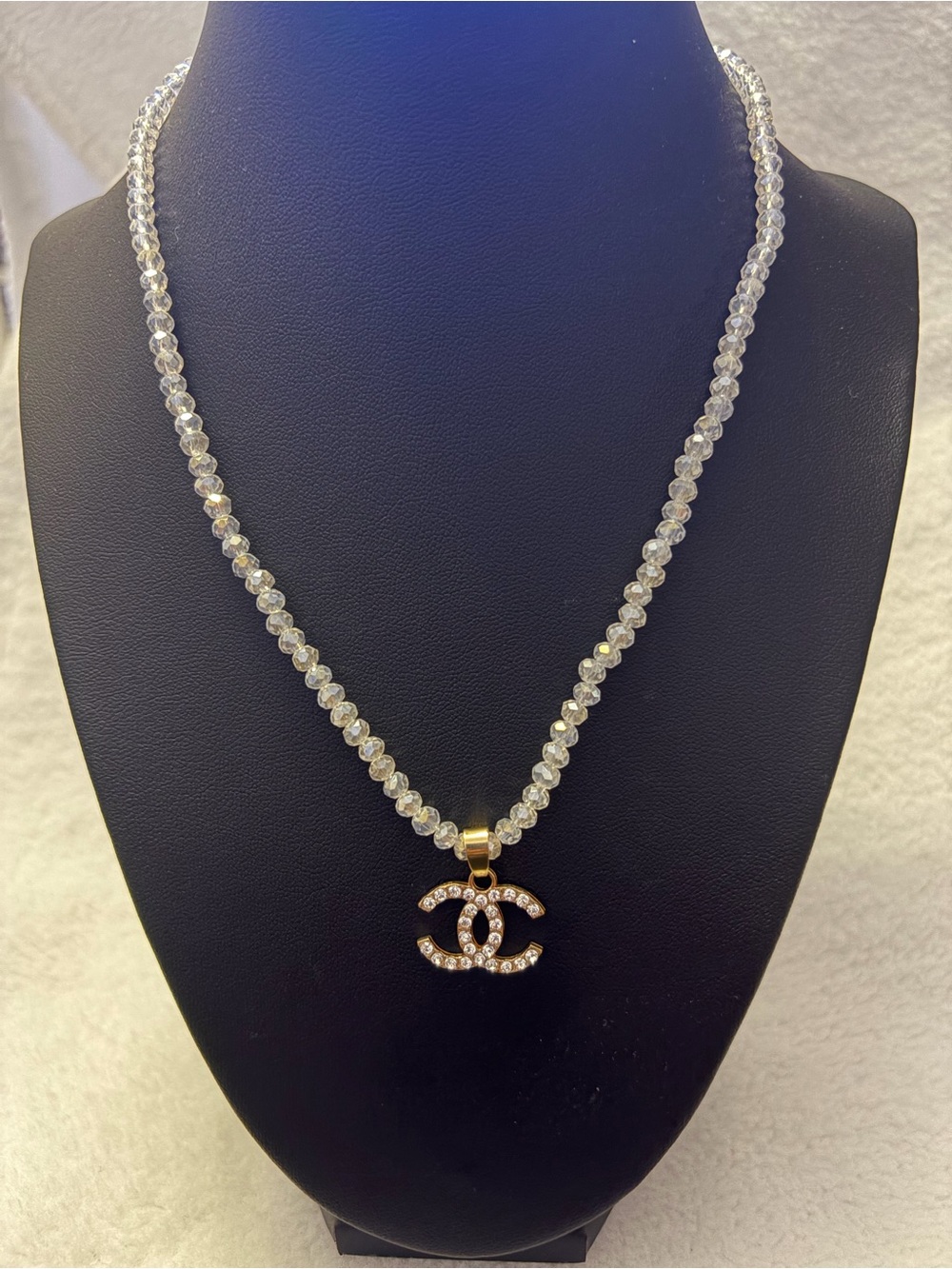 Gold-Accent Clear Crystal Bead Necklace with Logo Pendant